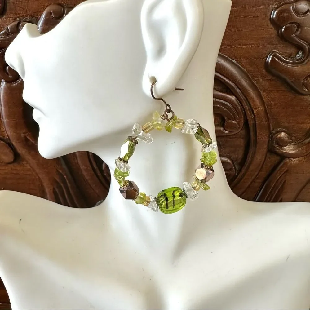 Green beaded circle earrings